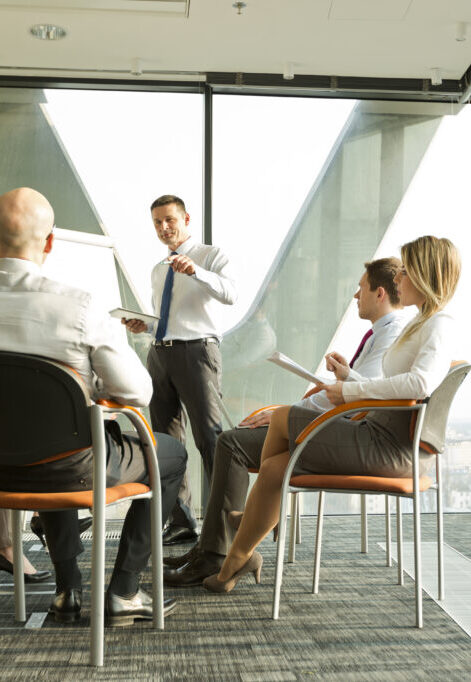 Group of businesspeople attending a seminar