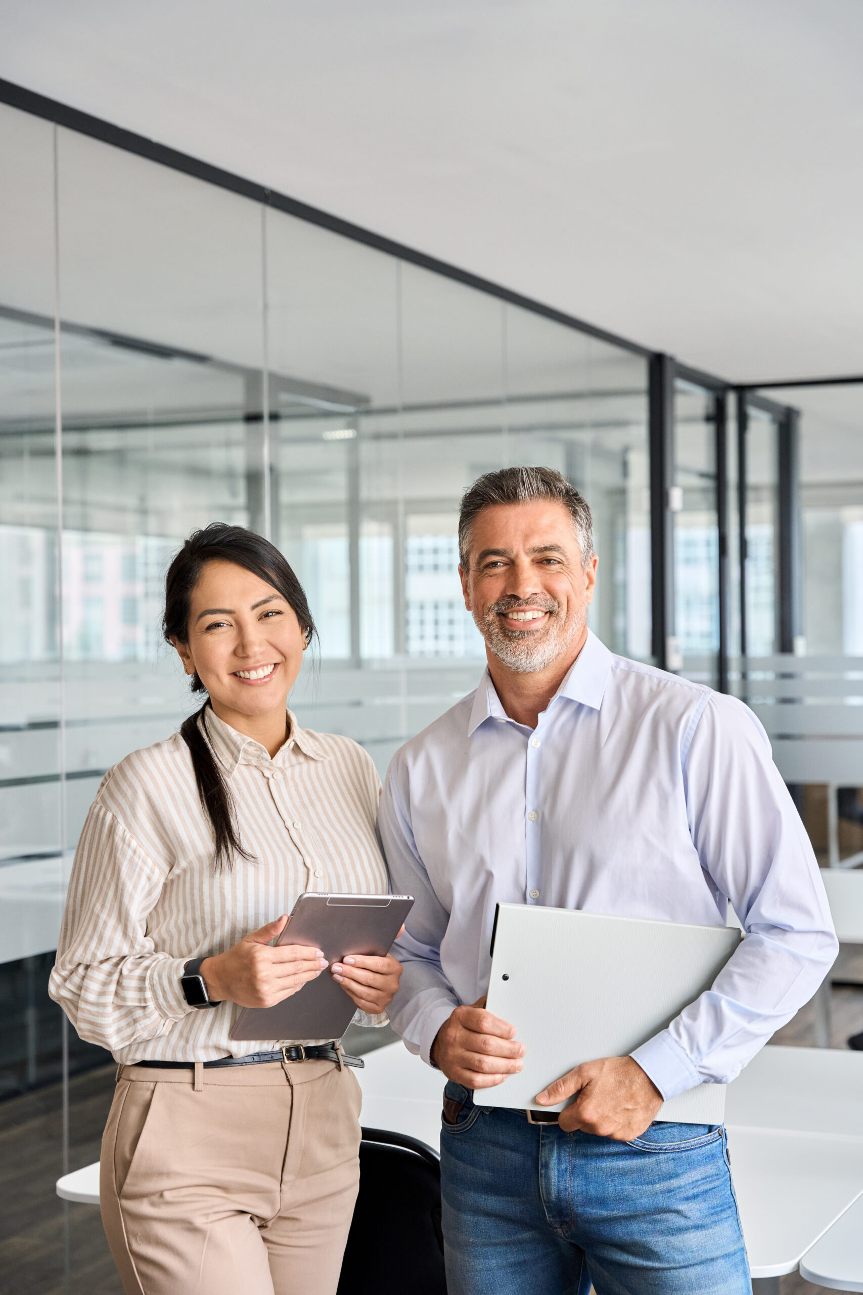 Happy diverse professional business man and woman team in office, portrait.